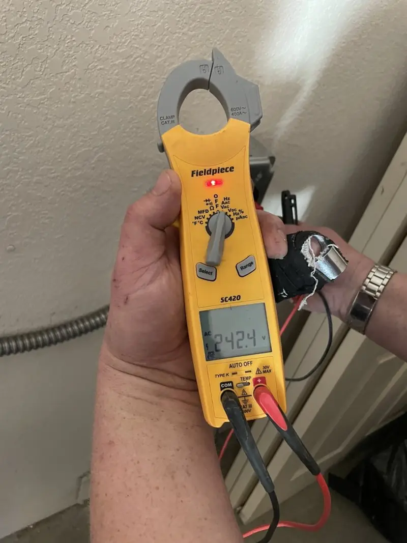 Voltage testing with clamp meter during Generator Installation in Lemoore Station